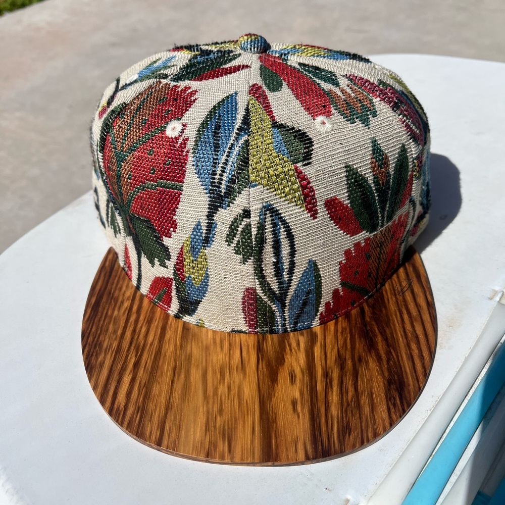 Floral Snap Back with wooden bill. Great condition! Worn once.